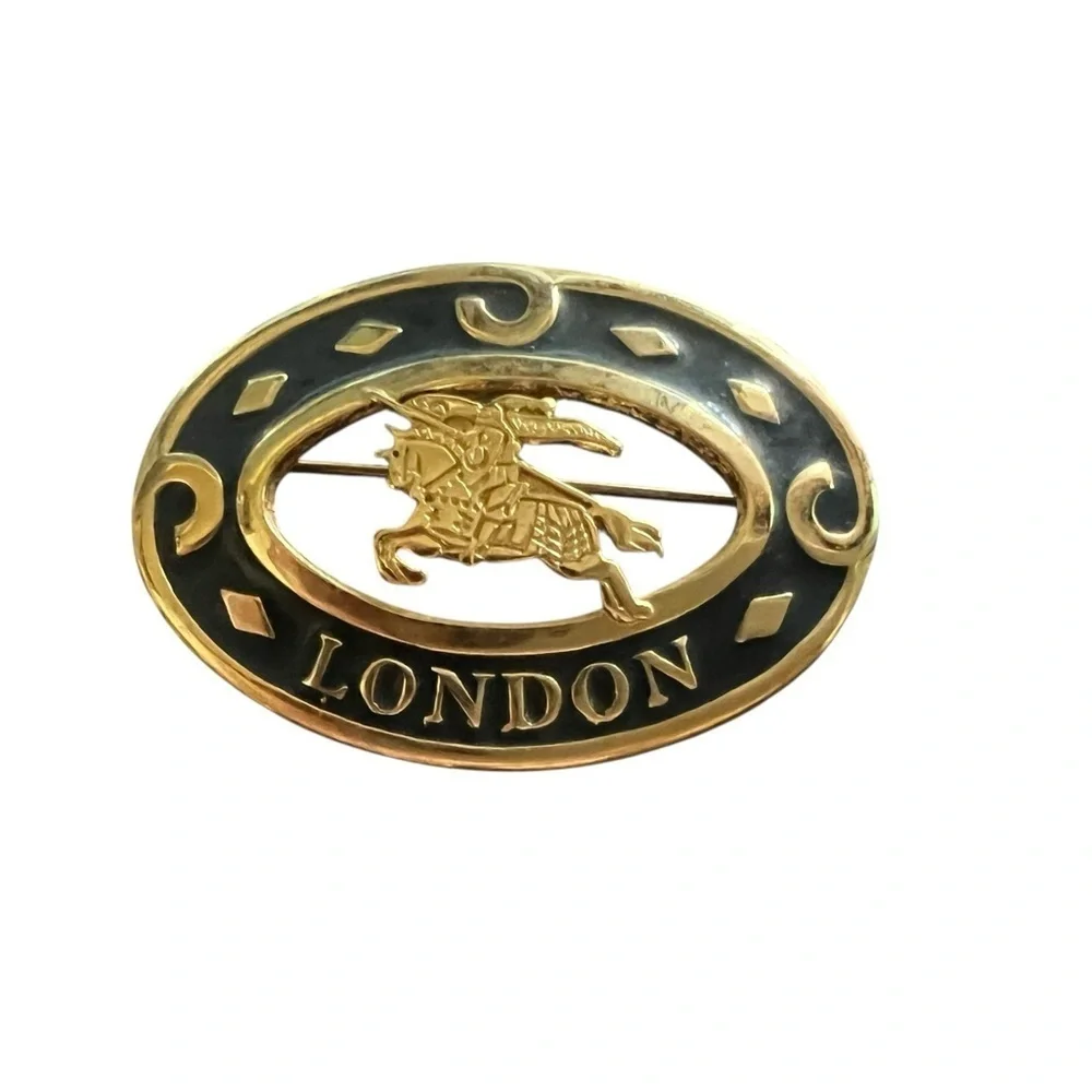 Burberry Gold and Black Brooch